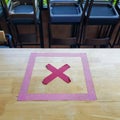 High angle view of cross sign on table