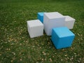 High Angle View of Cubed White and Cyan Table and Seats at the Park