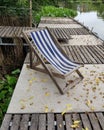 High angle view of deck chair at waterfront Royalty Free Stock Photo