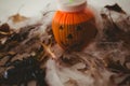 High angle view of drink in jack o lantern container with decorations