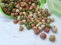 High angle view of dry dog food in a green box Royalty Free Stock Photo