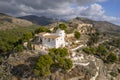 High angle view of Ermita La Magdalena and old castle ruins in Castellon on a sunny day with scattered clouds Royalty Free Stock Photo