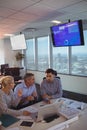 High angle view of focused business partners discussing at office Royalty Free Stock Photo