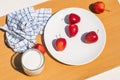 High angle view of fresh mini apple and a glass of milk on wooden cutting board Royalty Free Stock Photo