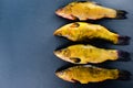 High angle view of fresh tench fish on slate background, close u Royalty Free Stock Photo
