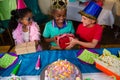 High angle view of friends giving gifts to boy Royalty Free Stock Photo