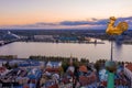 High angle view of a golden cock, rooster statue, over Riga old town in Latvia