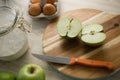 High angle view of granny smith apple halved on cutting board Royalty Free Stock Photo