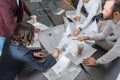 high angle view of group of architects working together on building plans Royalty Free Stock Photo