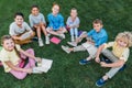 high angle view of group of happy schoolchildren