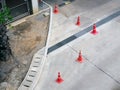 High Angle View of Group of Orange Plastic Road Cones