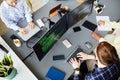 Programmers working on computers at office