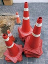 Group of Stacked Orange Traffic Road Cones Royalty Free Stock Photo