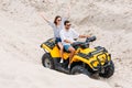 high angle view of happy young couple riding ATV Royalty Free Stock Photo