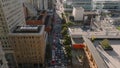 High angle view of heavy traffic on multilane oneway street in city. Forwards fly above business urban borough. San