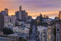 High angle view of homes on the famous crooked Lombard Street, San Francisco California with fiery skies at sunset