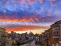 High angle view of homes on the famous crooked Lombard Street, San Francisco California with fiery skies at sunset