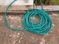 High angle view of hose in garden Royalty Free Stock Photo