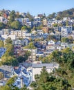 High angle view of houses and apartments on a slope from Kate Hill park in San Francisco, CA