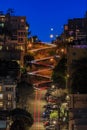 High angle view of illuminated homes on Lombard Street in San Francisco, California at sunset with car light trails Royalty Free Stock Photo