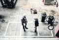 A high angle view of an industrial man and woman engineer in a factory. Royalty Free Stock Photo