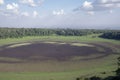 High angle view of large abandoned dried up watering hole in Marsabit National Park Royalty Free Stock Photo