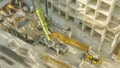 High angle view of a large construction site with multiple buildings and cranes Royalty Free Stock Photo