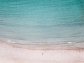 Aerial view of lonely man on the beach Royalty Free Stock Photo