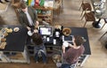 High angle view of man paying over counter at a coffee shop Royalty Free Stock Photo