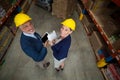 High angle view of managers are wearing hard hat and looking the camera Royalty Free Stock Photo