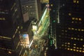 High Angle View of New York City Avenues. Tiny vehicles Moving, Traffic, Street Lights as Seen from the 48th Floor of a Skyscraper