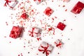 Overhead view of many Christmas presents wrapped with white paper on flat white surface background, neural network Royalty Free Stock Photo