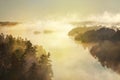 High angle view of misty lake and pines at sunrise in the boundary waters of Minnesota Royalty Free Stock Photo