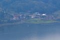 High-Angle View Of The Misty Scenery After Rain, With Settlements By Lake Buyan Royalty Free Stock Photo