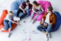 high angle view of multicultural colleagues discussing startup project Royalty Free Stock Photo