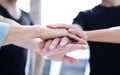 Closeup of a business colleagues with their hands stacked togeth Royalty Free Stock Photo