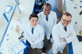 High angle view of multiracial group of scientists standing together Royalty Free Stock Photo