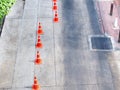 High Angle View of Orange Traffic Cones on Street Royalty Free Stock Photo