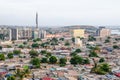 High angle view over slums of Luanda with Mausoleum of Agostinho Neto tower in background, Angola, Africa