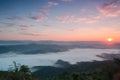 High angle view over tropical mountains with white fog in early Royalty Free Stock Photo