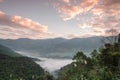 High angle view over tropical mountains with white fog in early Royalty Free Stock Photo