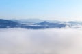 High angle view over tropical mountains with white fog in early morning Royalty Free Stock Photo