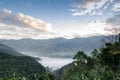 High angle view over tropical mountains with white fog in early Royalty Free Stock Photo