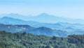 High angle view over tropical rainforest mountains with white fog in the morning Royalty Free Stock Photo