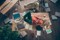 High angle view photo of corporate messy atmosphere careless blond business lady lying table don`t mind cluttered office