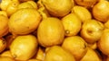High angle view of a pile of lemons on sale in a night market.