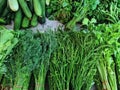 Piles of Fresh Green Vegetables for Sale at Market Stall