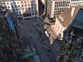 High angle view of popular town square Stephansplatz in the historic center of Vienna, Austria with people and fiacres.