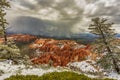 High angle view of the red rocks under the cloudy sky in the Bryce Canyon National Park, Utah, USA Royalty Free Stock Photo