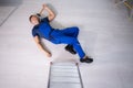 Repairman Fallen From Ladder Royalty Free Stock Photo